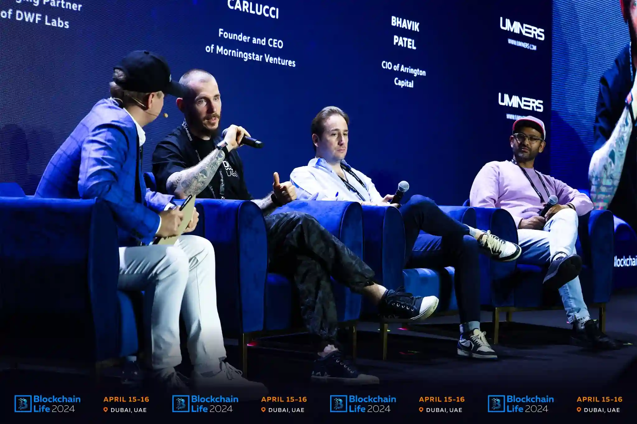 Managing Partner of DWF Labs Andrei Grachev on stage at Blockchain Life Forum April 2024 alongside fellow panelists Sergei Khitrov, Danilo Carlucci, and Bhavik Patel.